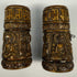 Antique Tibetan bone carving with seated Buddha figure and detailed ritual decoration