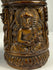 Tibetan Buddhist ritual prayer wheel carved from human femur bone with detailed relief decoration