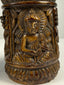 Tibetan Buddhist ritual prayer wheel carved from human femur bone with detailed relief decoration