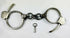 Antique Tower Detective handcuffs with original key, U.S., early 20th century