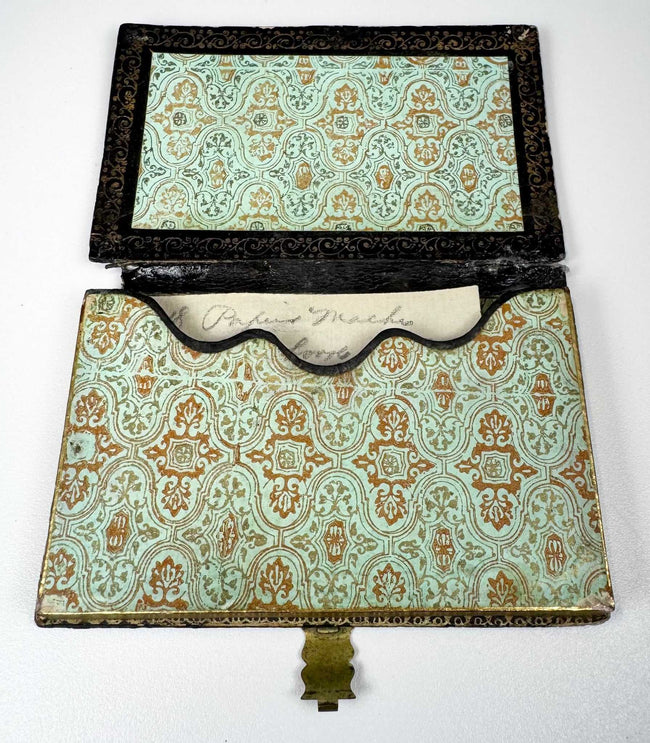 Open Victorian calling card case showing original-style patterned paper lining and shaped interior card pocket