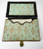 Open Victorian calling card case showing original-style patterned paper lining and shaped interior card pocket
