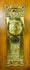 Antique Reading Hardware Company lockset mounted on wooden demonstration board