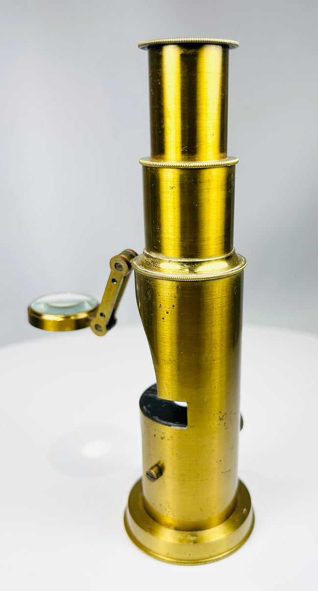 Antique brass microscope used by Victorian naturalists with original wooden case