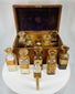 antique pharmaceutical box with labeled glass containers and cork stoppers