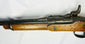 Close-up of the Snider-Enfield Mk II breechblock conversion system and forestock screws with patinated steel surfaces.