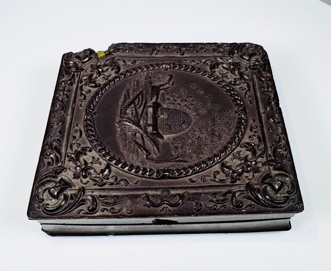 Collectible 19th century daguerreotype photographs with beehive motif Union case