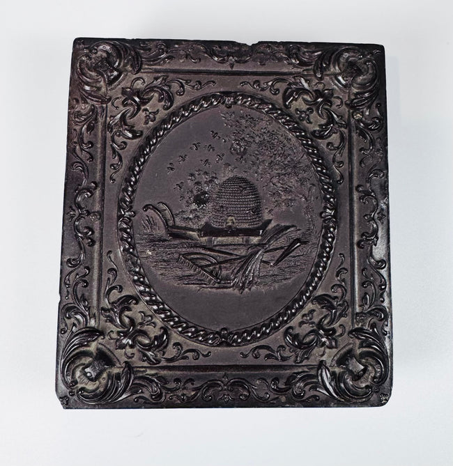 Antique sixth-plate daguerreotype double portrait featuring Victorian couple