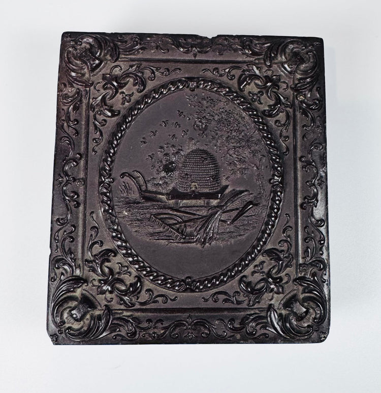 Antique sixth-plate daguerreotype double portrait featuring Victorian couple