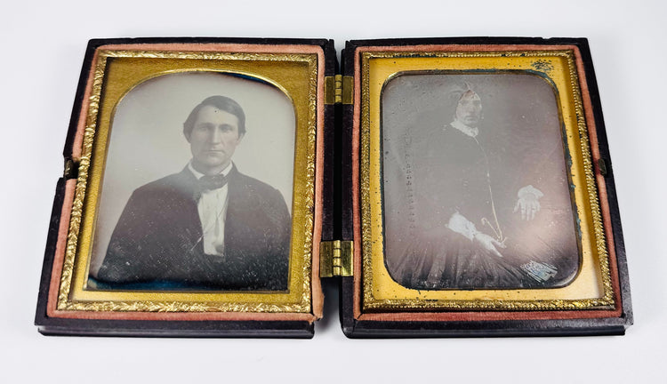 Victorian era husband and wife daguerreotypes displayed in decorative thermoplastic case
