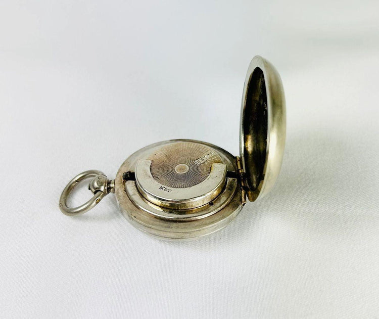 Victorian-era sterling silver sovereign holder with engraved monogram and spring-loaded mechanism, circa 1880s, United Kingdom. Compact and elegantly crafted for securely holding sovereign coins. Reflects 19th-century silverwork craftsmanship, utility, and personalized luxury accessories.
