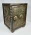 Early 20th century cast iron safe bank with hinged door and coin slot