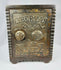 Vintage American cast iron safe bank with ornate Victorian detailing