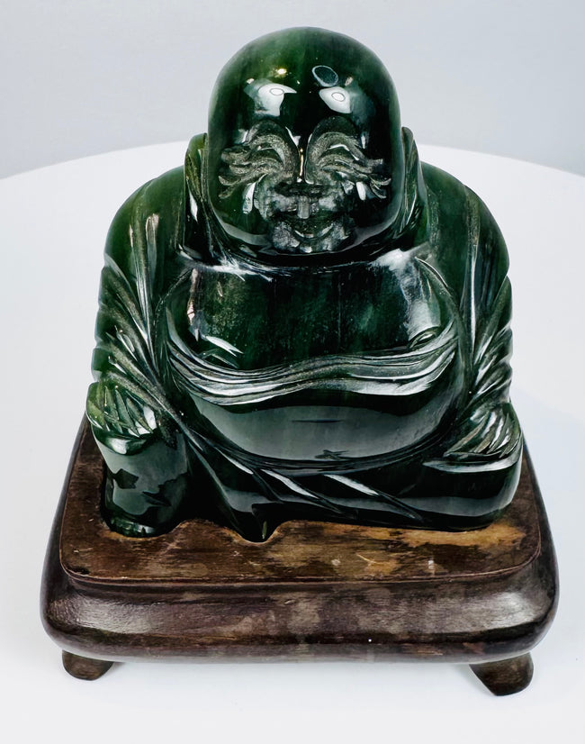 Front detail of vintage Chinese Budai Laughing Buddha hardstone sculpture with expressive facial carving