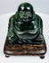 Front detail of vintage Chinese Budai Laughing Buddha hardstone sculpture with expressive facial carving