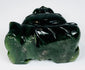 Underside view of vintage Chinese hardstone Budai carving showing natural stone and carving marks