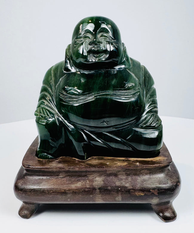 Front view of Chinese hardstone Laughing Buddha sculpture with polished dark green surface