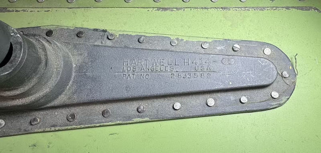 Authentic Cold War-era USAF Boeing 737 cargo door with military insignia, lettering and operational stencils