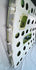 Angled rear view of the USAF aircraft cargo door with green structural framework and riveted aluminum skin