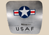 Full front view of a Boeing 737 USAF aft cargo door with Star and Bars insignia and polished aluminum skin