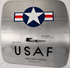 Front view of a vintage USAF Boeing 737 cargo door with military roundel, riveted aluminum skin and original stenciling