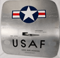 Front view of a vintage USAF Boeing 737 cargo door with military roundel, riveted aluminum skin and original stenciling