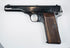 FN Browning Model 1922 showing slide serrations, a manual safety lever, and age-related wear along the steel frame.