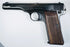 Deactivated FN Browning Model 1922 with factory slide inscriptions, an extended barrel assembly, and a checkered walnut grip.