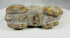 Vintage African stone effigy with minimalist carving and natural wear
