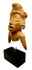 Frontal view of fragmentary terracotta human effigy with stylized headdress