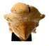 Top-down view of terracotta headdress structure and speckled clay texture