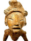 Detail shot of ancient West Mexican terracotta head with deeply incised eyes