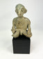 Pre-Columbian West Mexican Nayarit Chinesco terracotta seated male figure on display stand