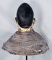 Historic West African Egungun headdress displaying carved ancestral imagery and original woven fiber support.