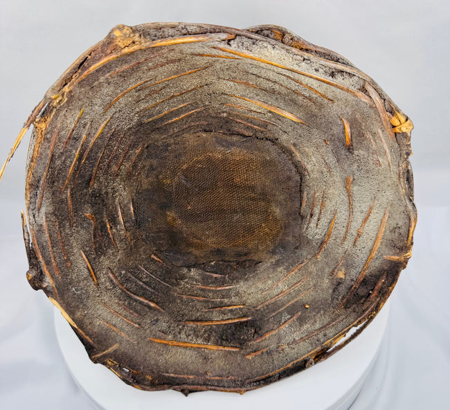Rare Yoruba ceremonial headpiece used in ancestor-veneration traditions with preserved wicker and pigment details.