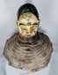 Mid-century African masquerade headdress attributed to the Yoruba people with woven fiber and wood components.