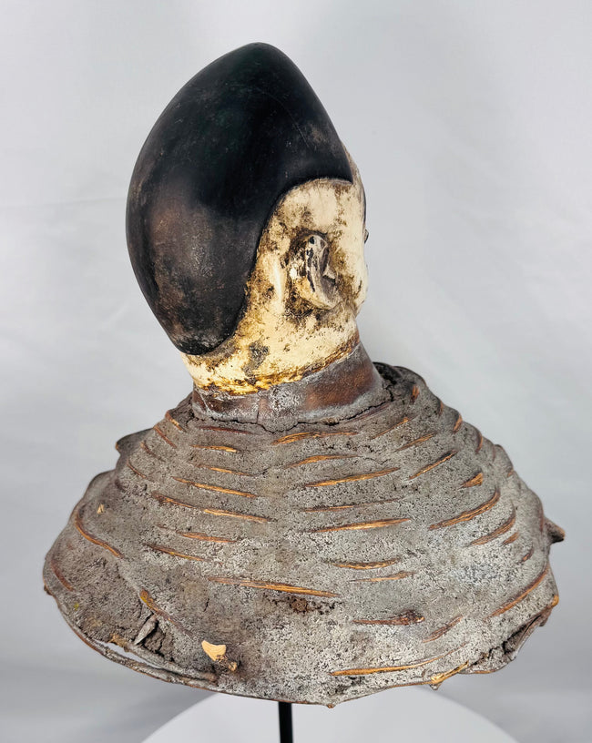 Historic Yoruba ceremonial headdress mounted on a woven wicker support used in Egungun ancestor-veneration festivals.