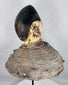 Historic Yoruba ceremonial headdress mounted on a woven wicker support used in Egungun ancestor-veneration festivals.