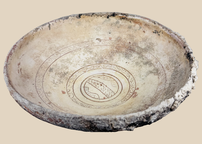 Authentic Byzantine sgraffito slipware bowl from the Eastern Mediterranean dating to the 10th–14th century CE.