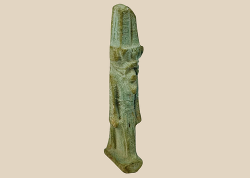 Ancient Egyptian faience amulet depicting the god Nefertem with lotus crown from the Late Period.