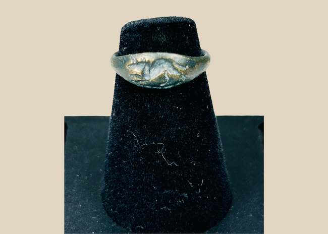 Ancient Roman bronze ring with raised mouse motif bezel and archaeological patina