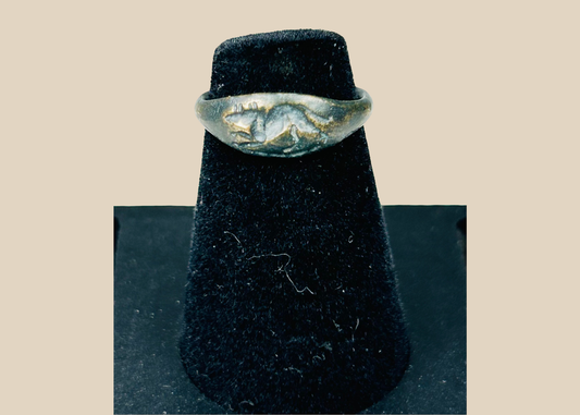 Ancient Roman bronze ring with raised mouse motif bezel and archaeological patina