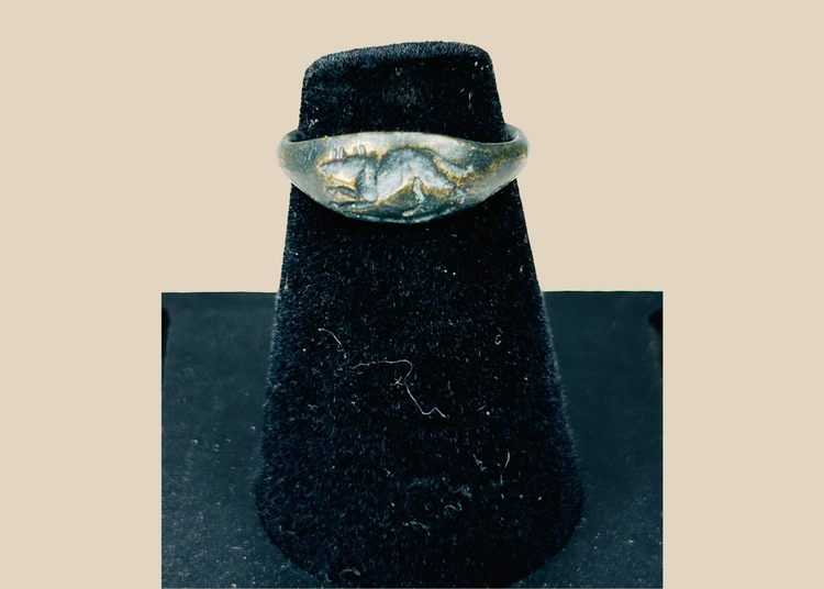 Ancient Roman bronze ring with raised mouse motif bezel and archaeological patina