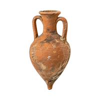 Ancient terracotta amphora representing antiquities and archaeological artifacts requiring special international shipping review.