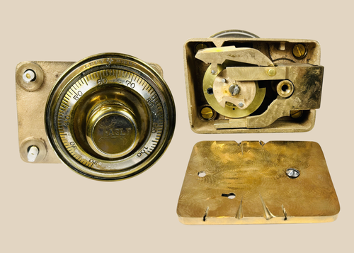 Antique Eagle safe lock mechanism with brass combination dial front view