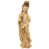 Antique carved ivory figure representing animal-derived artifacts that may require CITES documentation for international shipping.