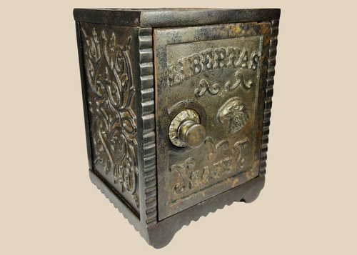 Antique Libertas Safe cast iron still bank with eagle motif and embossed front
