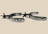 Pair of antique Western steel spurs with engraved silver inlay and five-point rowels
