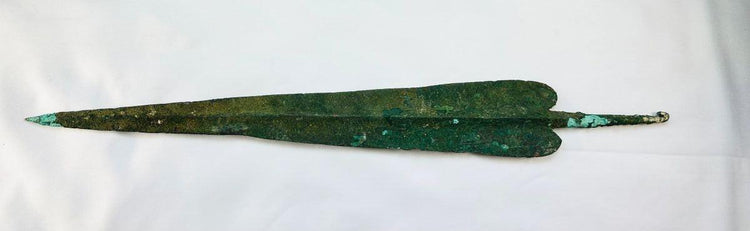 Ancient Cypriot bronze spear with finely crafted leaf-shaped blade and hooked tang, Early Bronze Age, circa 2500–1900 BCE.