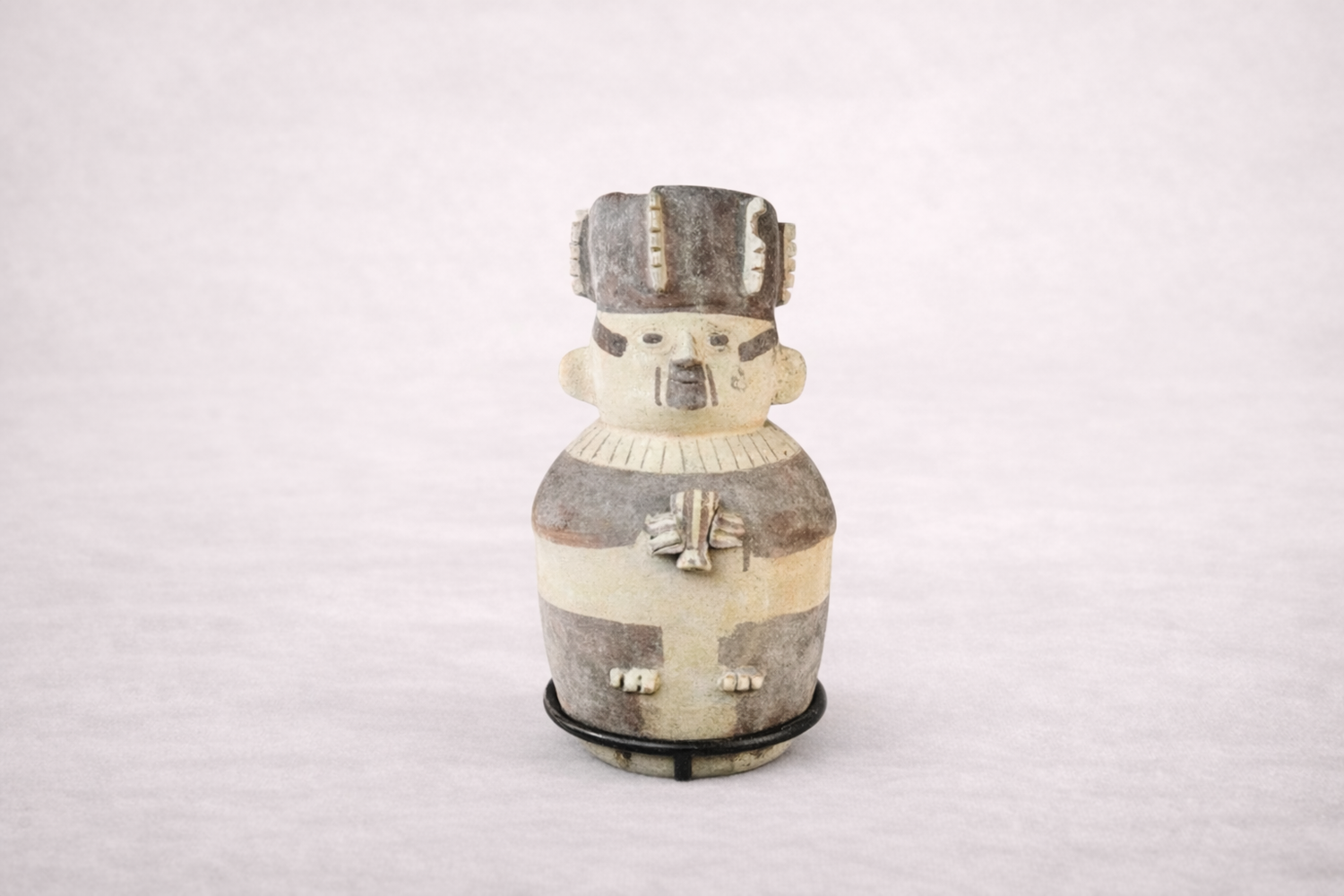 Chancay figural effigy urn circa 1000–1400 AD, pre-Columbian Peruvian ceramic vessel with stylized human form